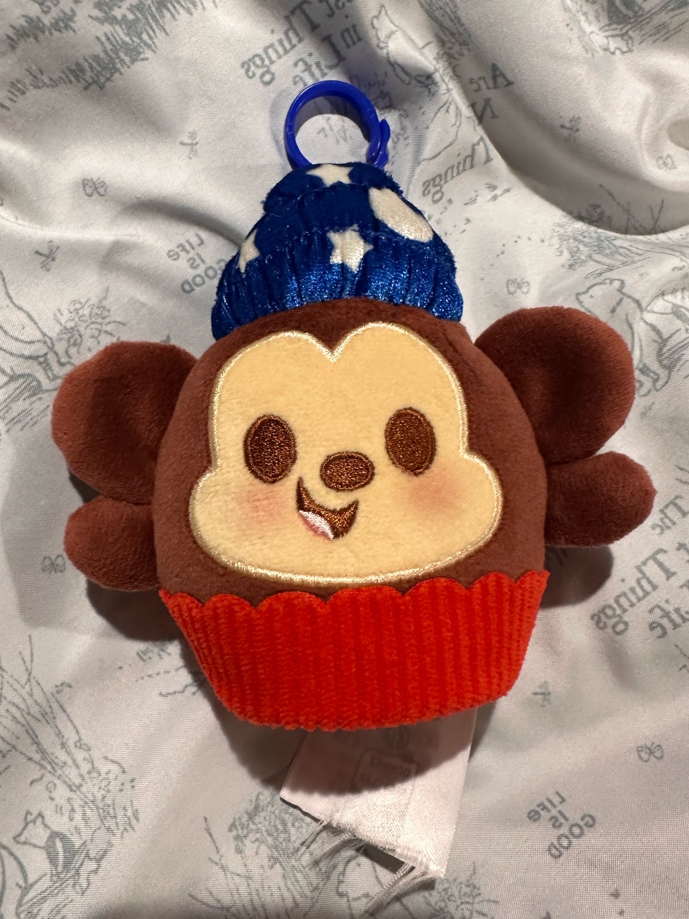 Disney Munchklin Mickey Fantasmic Plush with Blue Hat and Red Cupcake bottom